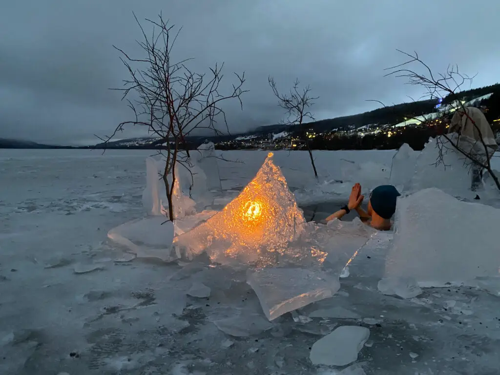 Winter swim ice light Sami Vaihoja