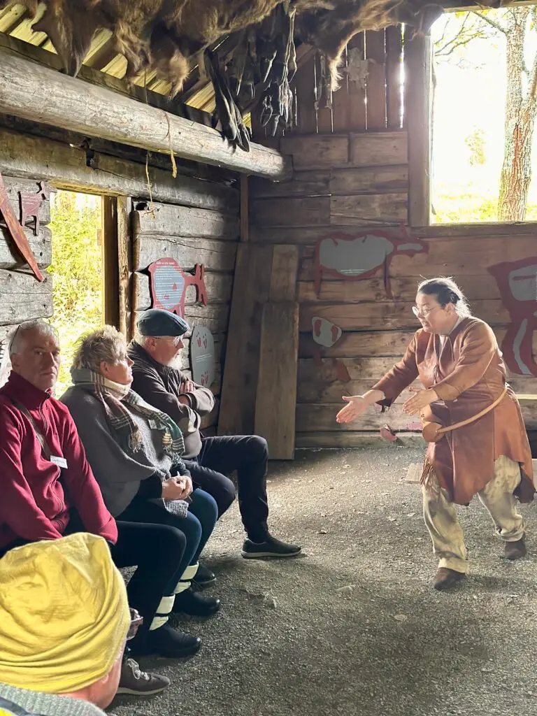Guide by the rock carvings of Glösa. Photo: Anne Adsten